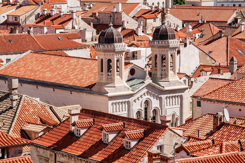 Croatia Dalmatia Dubrovnik Church among red terra cotta tile roofs in the old town of Dubrovnik